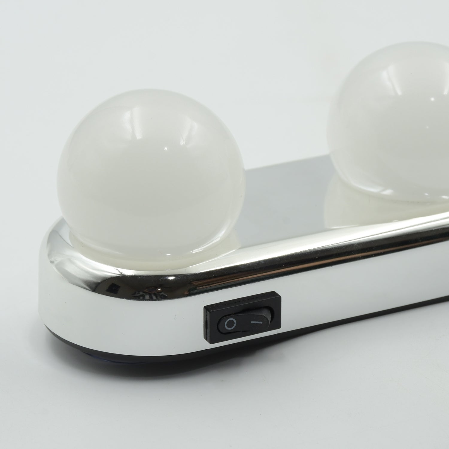 Portable makeup light kit with two round bulbs and an on-off switch for perfect lighting