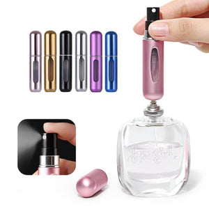 Collection of portable perfume spray bottles in various colors for easy on-the-go fragrance application