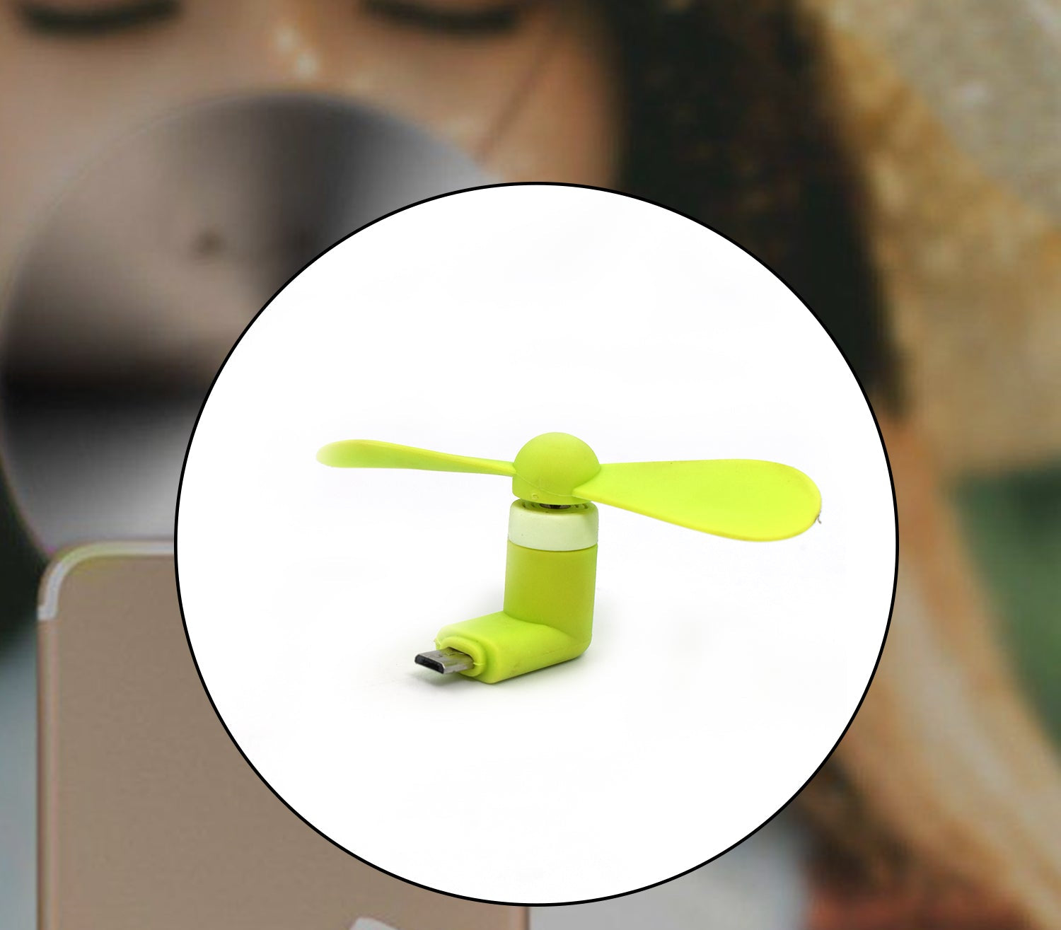 Portable USB fan in bright green color for kids, perfect for staying cool on warm days