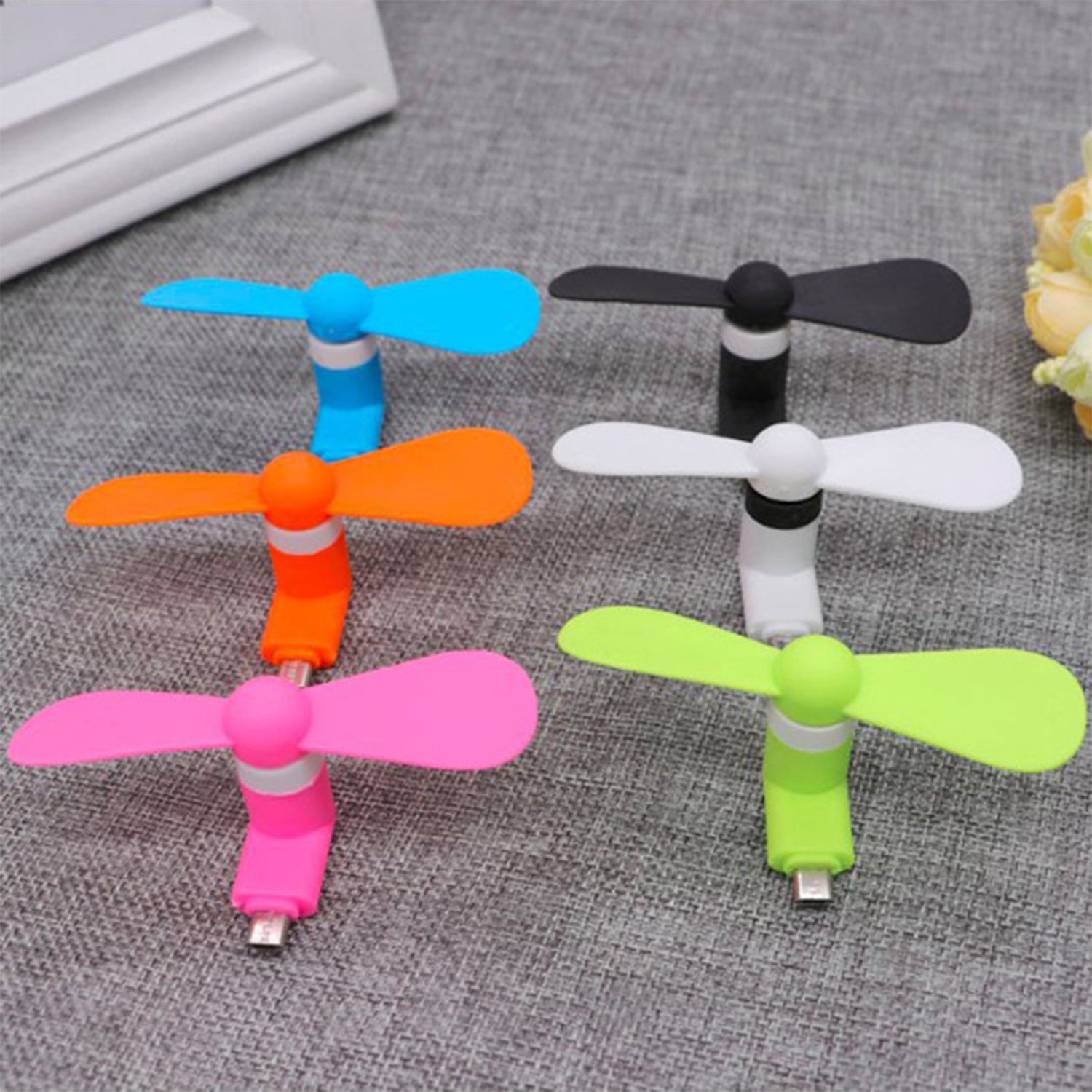 Colorful portable USB fan set in six vibrant colors for kids and outdoor use