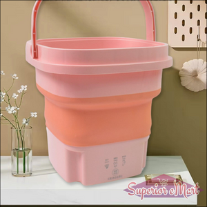 Pink foldable portable washing machine with ergonomic handle for space-saving laundry needs