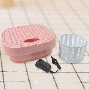 Portable washing machine foldable in pink with detachable basket and power cord for easy storage