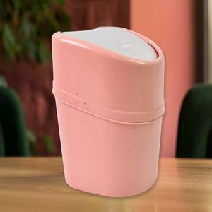 Pink mini trash can with lid for home and kitchen use, compact design for convenient waste disposal