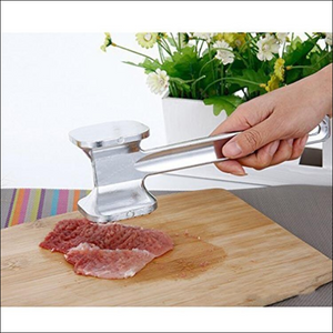 Superior eMart professional meat tenderizer hammer being used on meat for optimal texture