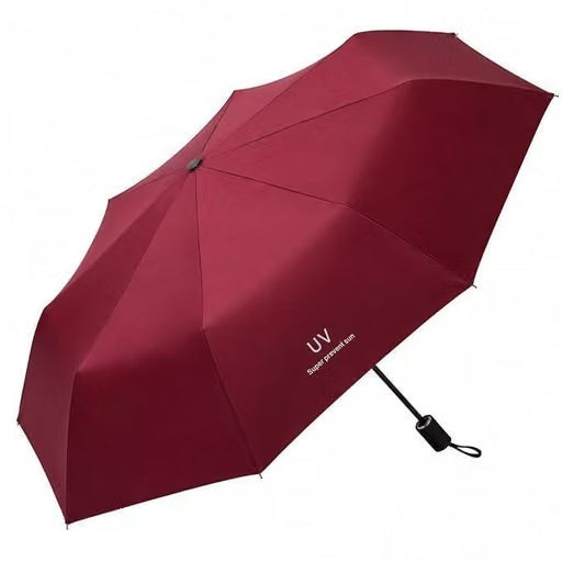 A dark red compact folding umbrella with a black handle, shown open against a plain white background. The canopy features white printed text reading 'UV' and 'smart protection'.