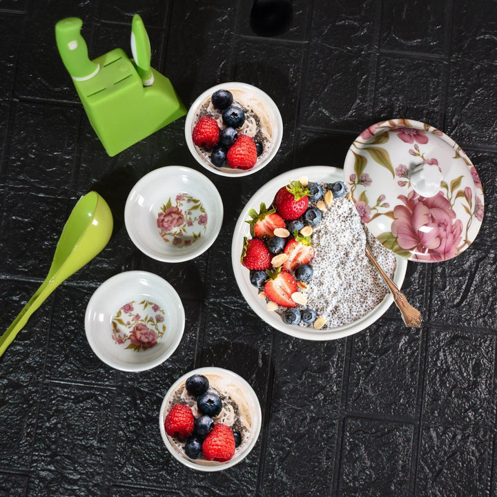 Stylish pudding serving set for home featuring decorative bowls and a spoon for desserts.