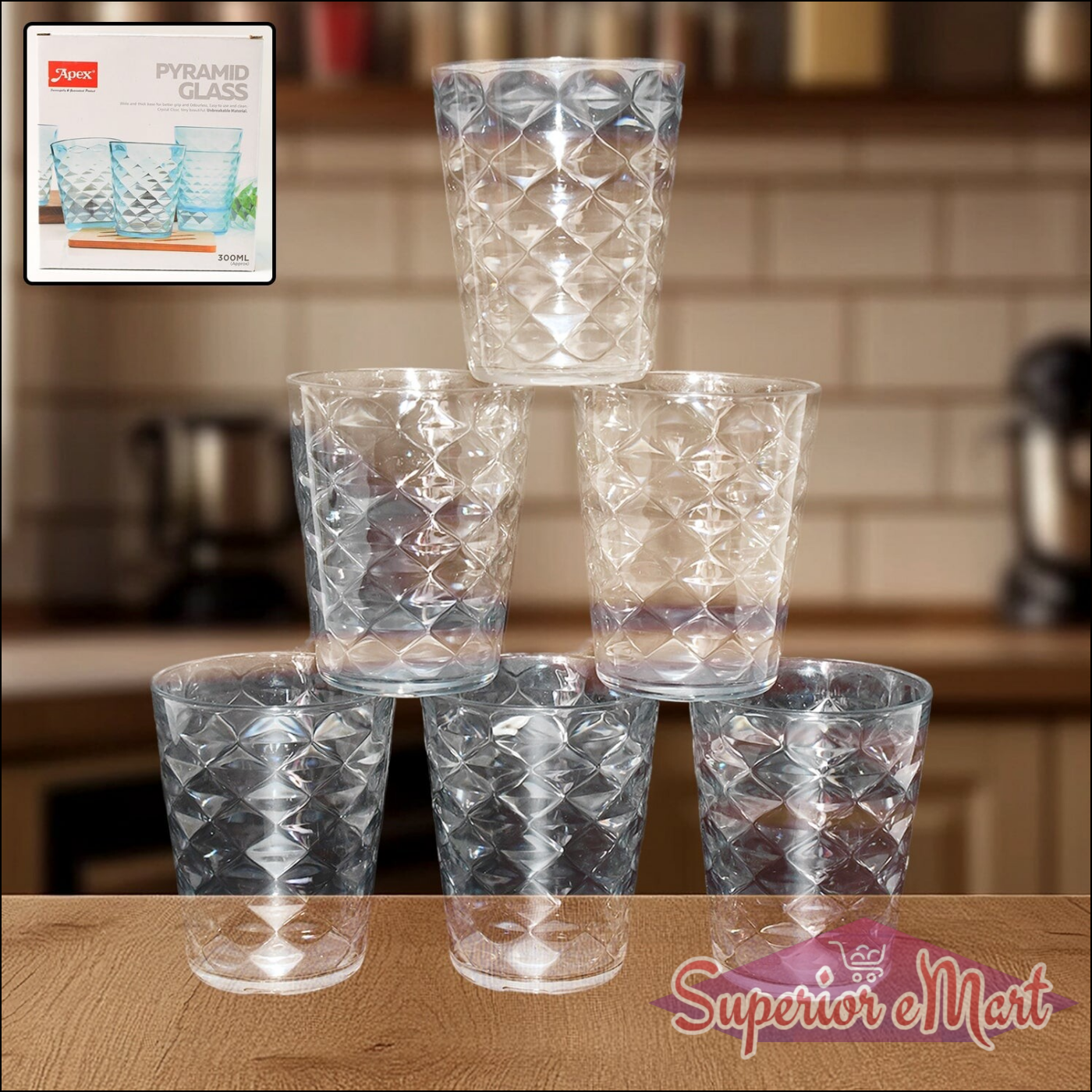 Set of six pyramid design unbreakable glass tumblers stacked on a kitchen counter