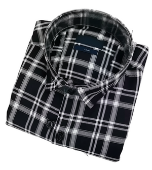 Folded black and white plaid shirt on a white background