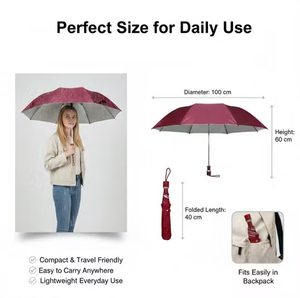 An infographic showing a burgundy and gray umbrella in both open and folded states, with text reading 'Perfect Size for Daily Use' and dimensions for diameter, height, and folded length. A woman is pictured holding the open umbrella on the left, and a small inset shows the folded umbrella in a backpack on the bottom right.