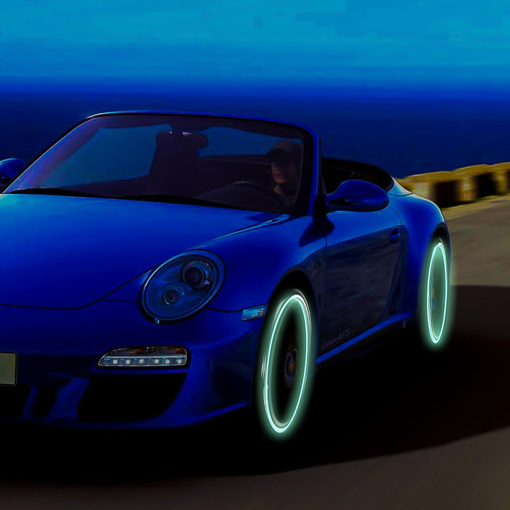 Superior eMart reflective car wheel stickers enhancing visibility on a blue convertible sports car