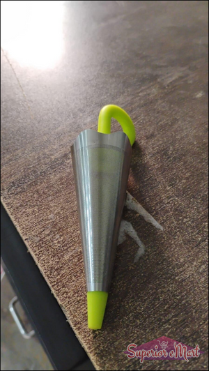 Cute umbrella tea strainer in stainless steel with a bright green handle for easy brewing