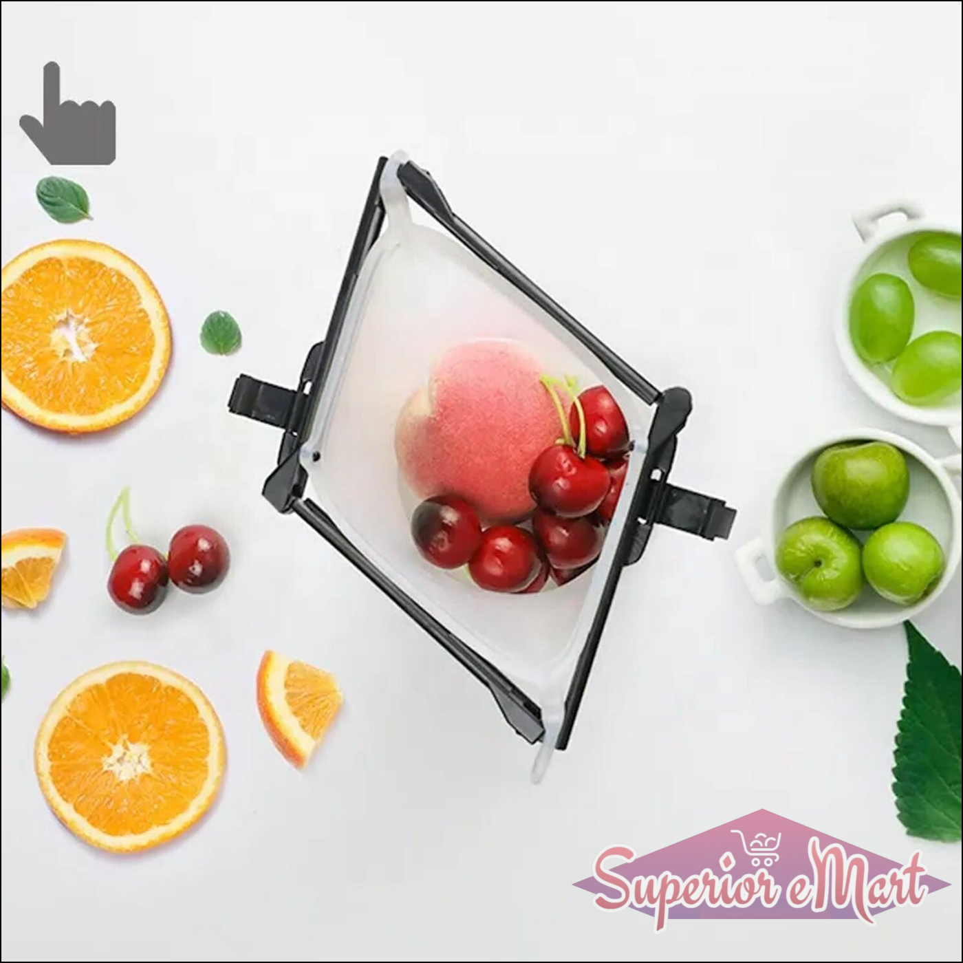 Reusable silicone food storage bag with fresh fruits including cherries and oranges on a white background