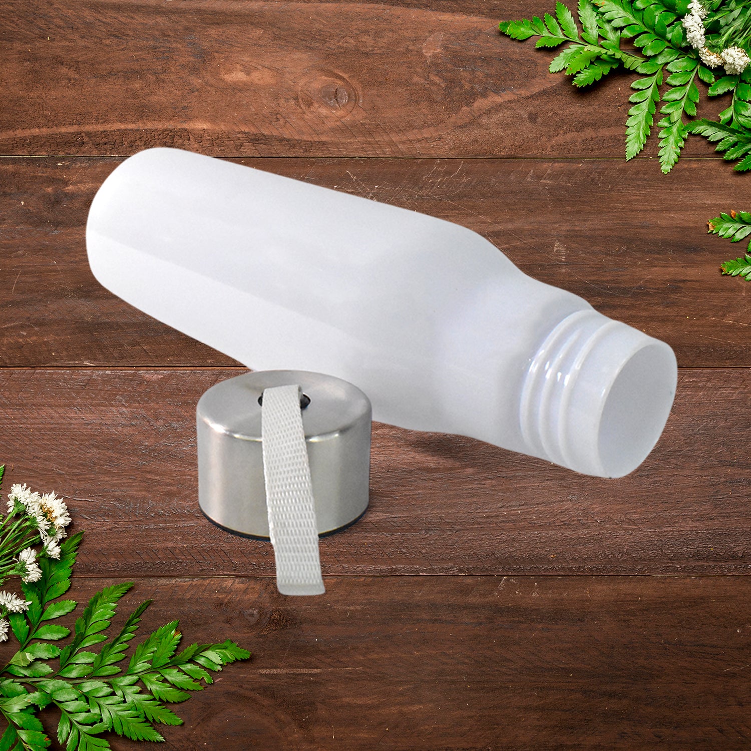 Superior eMart reusable water bottle 450ml with silver cap and carrying strap on wooden surface
