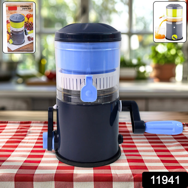 Superior eMart compact hand operated juicer in black and blue on a kitchen table with red checkered cloth