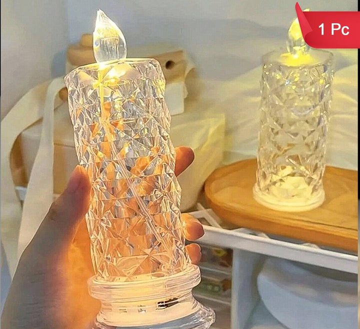 Transparent rose candle home light designed for elegant home decor with a warm glow