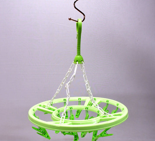 Superior eMart round hanger with clips for drying clothes, featuring a durable design in green