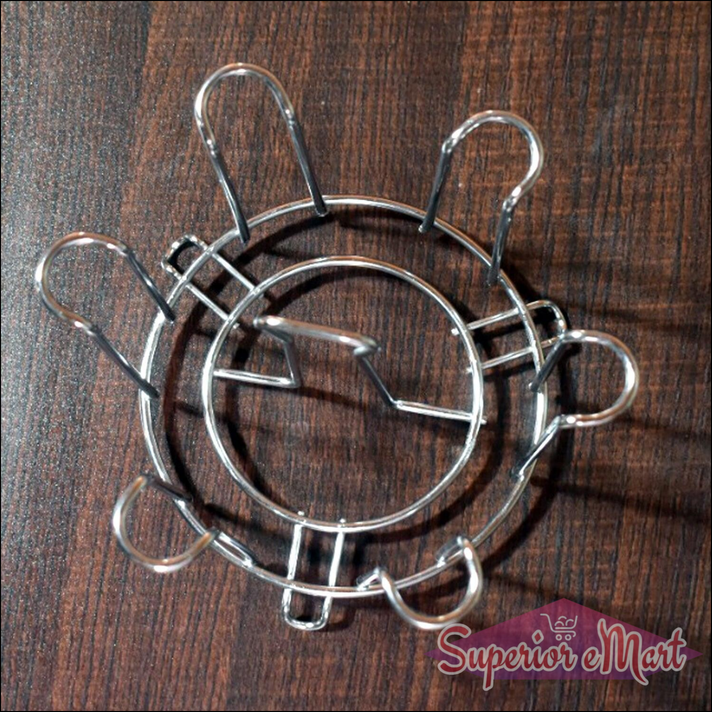 Round glass holder for kitchen made of durable metal, providing secure glass support