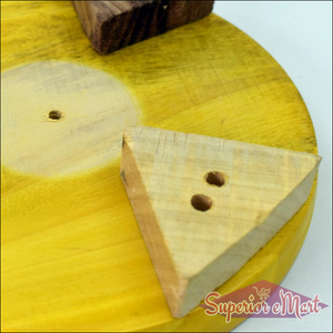 Wooden surface of a round roti maker for home use with triangle and square components