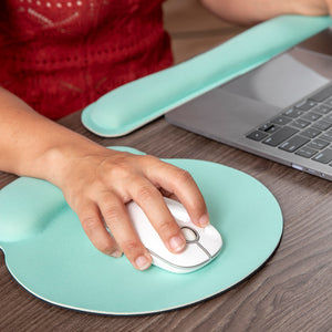 Ergonomic s shaped wrist mouse pad in teal for comfortable computer use and support