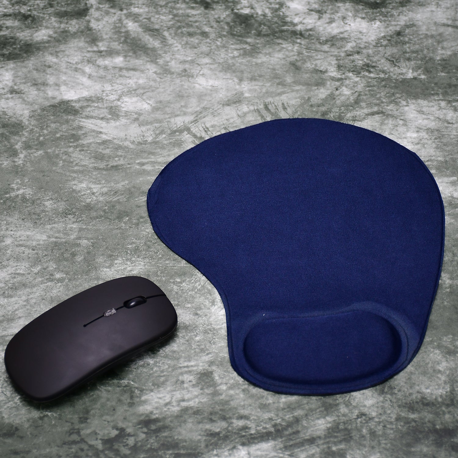 S shaped wrist mouse pad in navy blue with ergonomic design for comfortable computer use