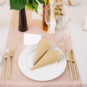 Elegant table setting with scalloped edge disposable napkins on a white plate for special occasions