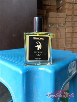 Scorpio Zodiac Unisex Perfume 50ml in a stylish bottle displayed on a blue table