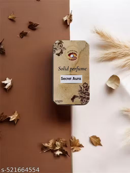 Secret Aura solid perfume in elegant packaging with floral design, perfect for on-the-go fragrance