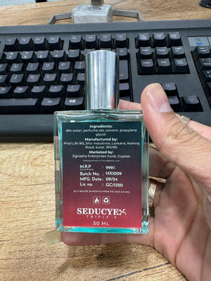Seducye Triplex extrait de parfum 50ml bottle showing label and ingredients held in hand