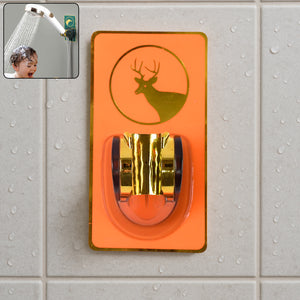 Self-adhesive shower head holder in orange, designed for easy installation and secure grip on bathroom tiles