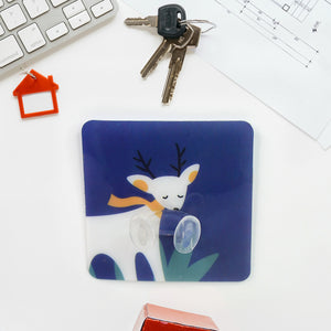 Decorative self-adhesive wall hook featuring a cute reindeer design for home organization