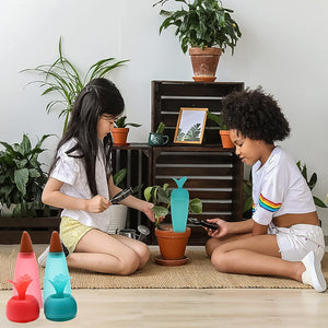 Two children using self watering plant spikes 1 Pc to care for potted plants indoors