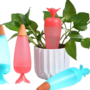 Colorful self watering plant spikes 1 Pc placed in a potted plant for efficient watering