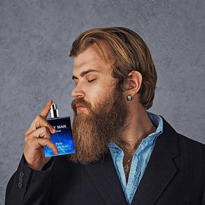 Man applying long-lasting cologne for men from Superior eMart, showcasing sophistication and style
