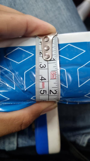 Superior eMart perfume bottle with a measurement tape showing its size, long-lasting cologne for men