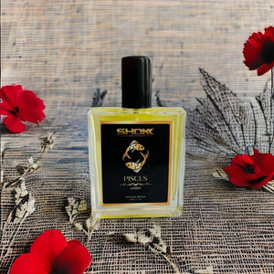 Pisces zodiac unisex perfume 50ml in a stylish bottle with floral background for versatile fragrance lovers