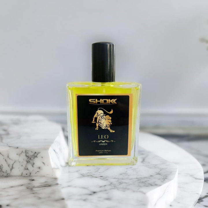 Leo zodiac unisex perfume 50ml by Superior eMart in clear square bottle with black cap on marble surface