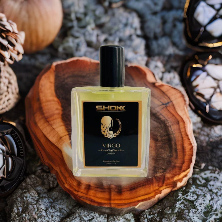 Virgo Zodiac Unisex Perfum 50ml bottle with black and gold label placed on a wooden tray