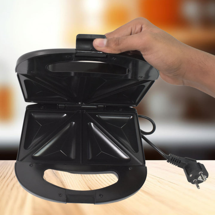 Superior eMart sandwich maker with indicator lights shown open with non-stick grilling plates and power cord