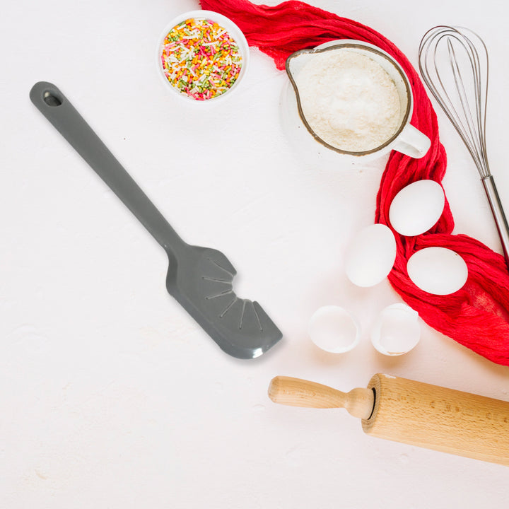 Superior eMart silicon whisk cleaner with baking tools on a kitchen countertop for effortless cooking