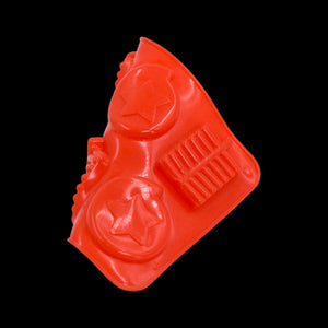 Red silicone chocolate mold tray with star shapes and bars for creative baking projects
