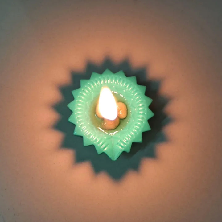 Glowing silicone diyas for Diwali in a star design, perfect for festive home decor.