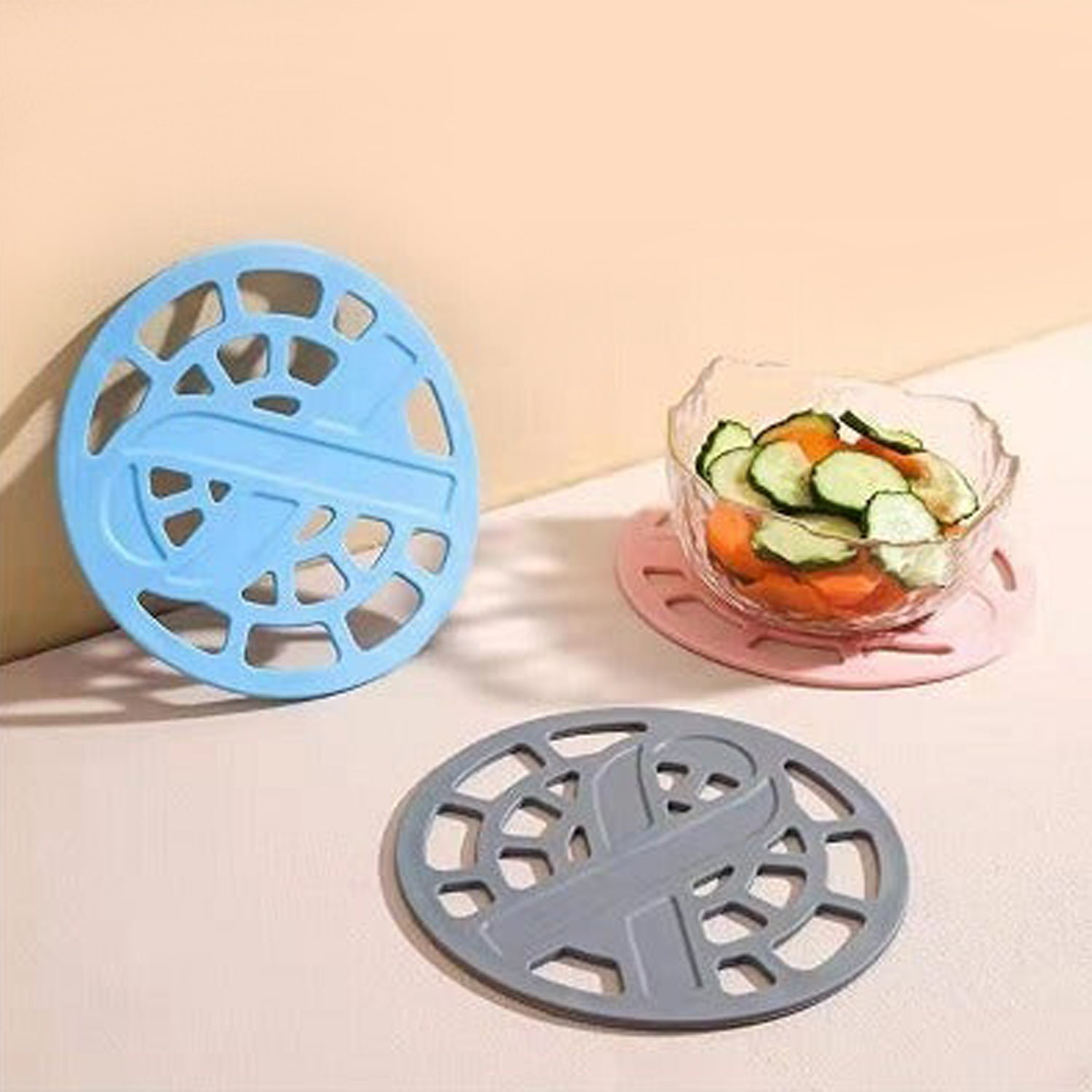 Colorful silicone fancy coasters in blue and pink for stylish home and kitchen decor