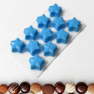 Silicone ice cube tray with star-shaped molds in blue, perfect for making fun ice shapes