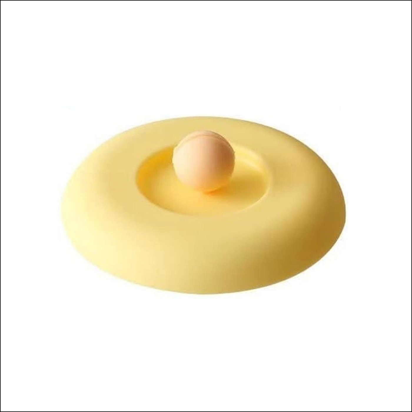 Yellow silicone mug lid with an airtight seal for keeping beverages fresh and warm