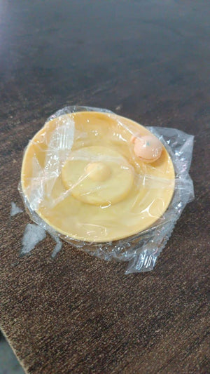 Yellow silicone mug lid with airtight seal for keeping beverages fresh and preventing spills