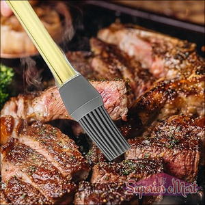 Silicone oil brush for cooking, applying oil on grilled meat for perfect flavor and moisture.