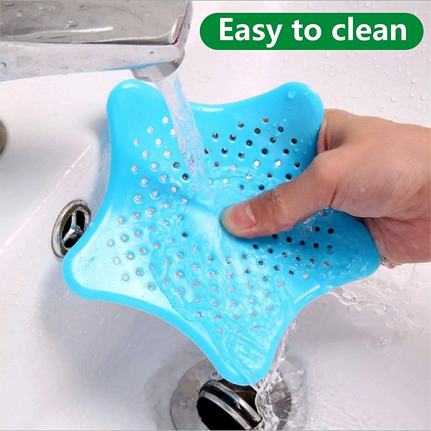 Silicone star shaped sink filter in blue, easy to clean and designed to catch debris in sinks