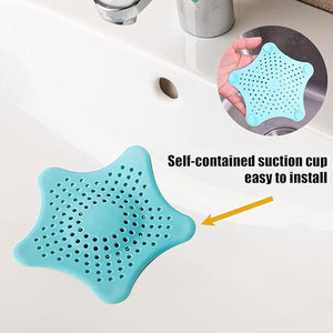Silicone star shaped sink filter in teal with self-contained suction cup for easy installation
