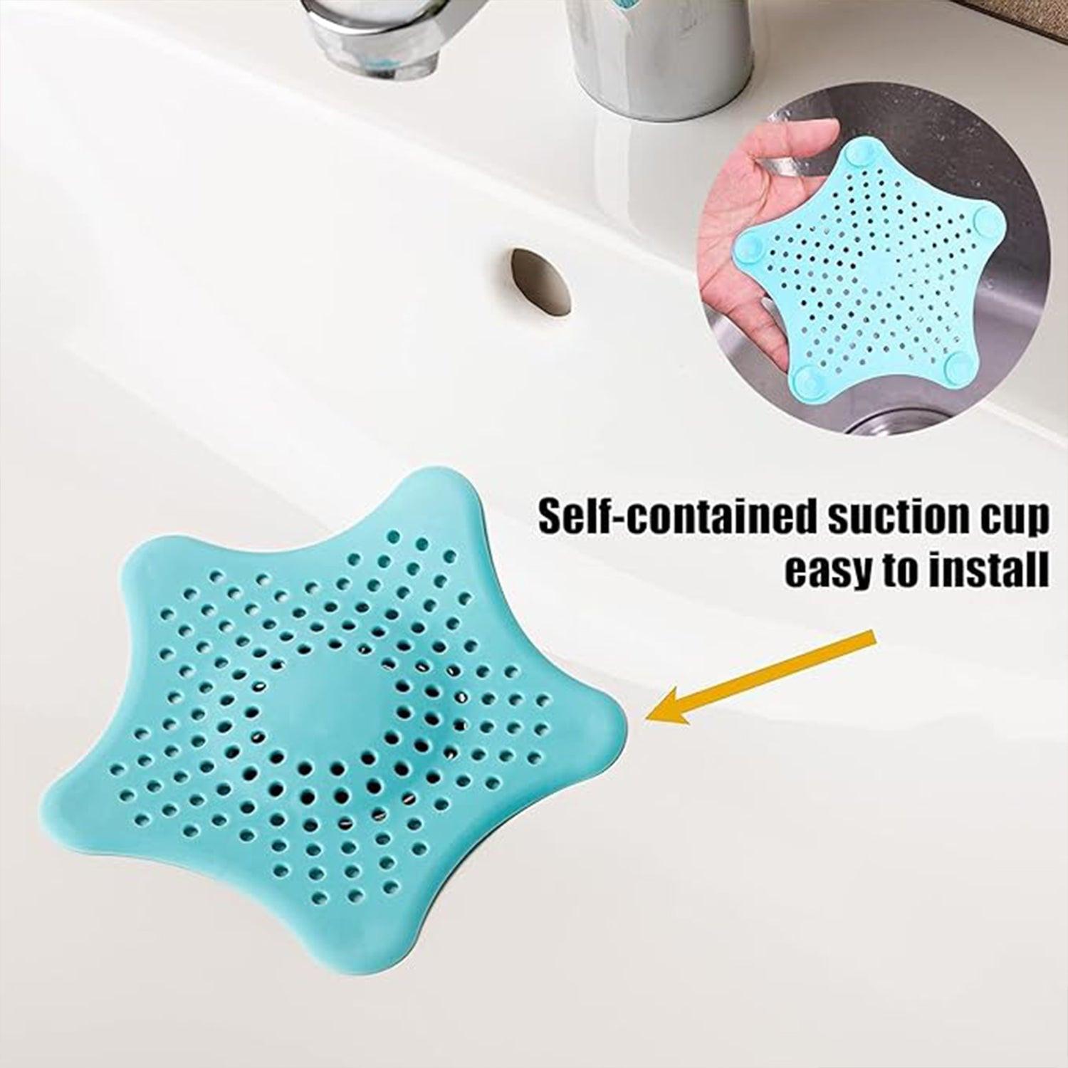 Silicone star shaped sink filter in teal with self-contained suction cup for easy installation
