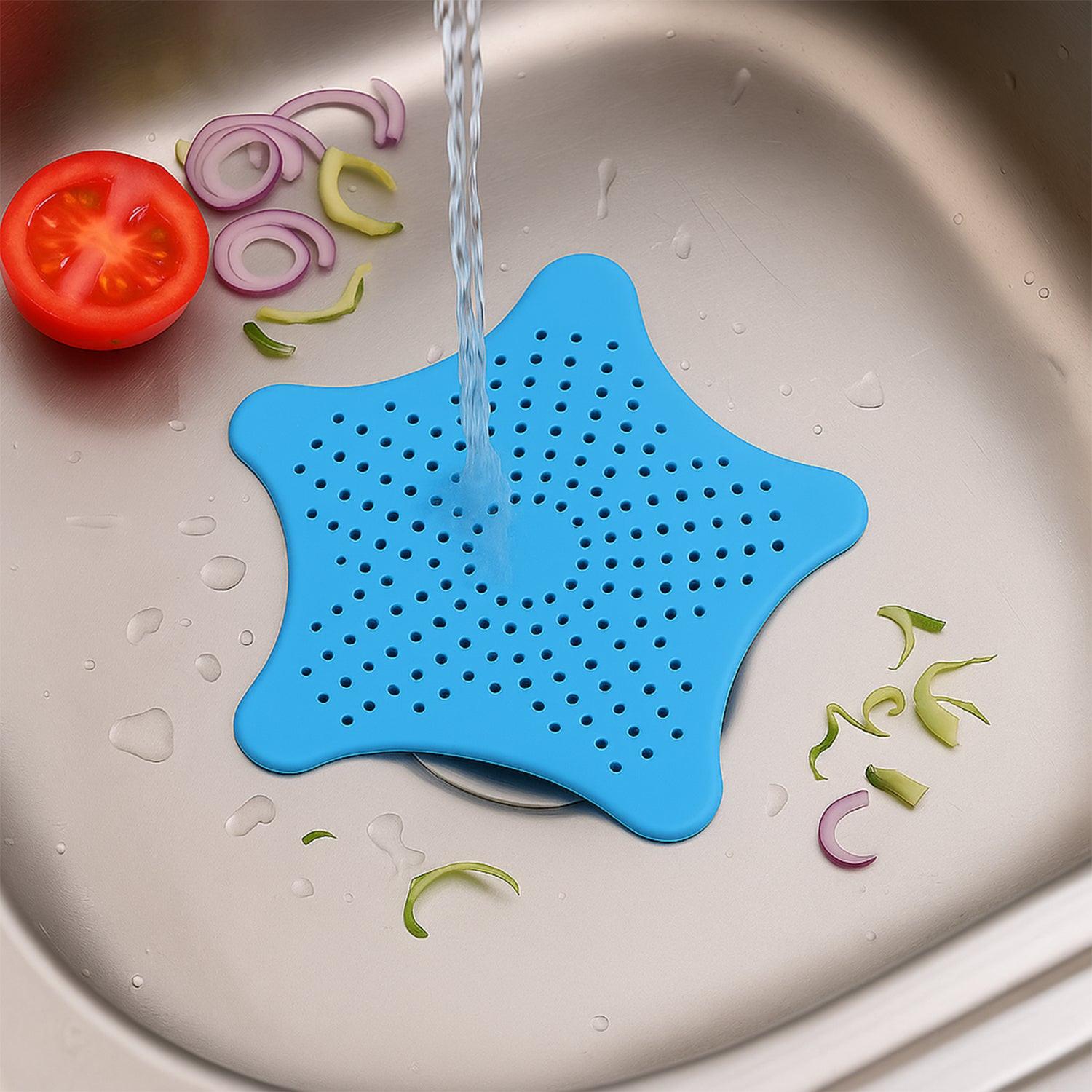 Blue silicone star shaped sink filter with perforations, designed for catching food debris in the kitchen sink